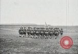Image of US Army troops and band marching with flag during training United States USA, 1916, second 35 stock footage video 65675022632