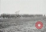 Image of US Army troops and band marching with flag during training United States USA, 1916, second 38 stock footage video 65675022632