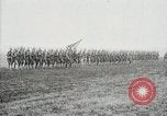 Image of US Army troops and band marching with flag during training United States USA, 1916, second 39 stock footage video 65675022632