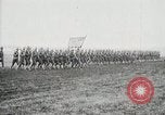 Image of US Army troops and band marching with flag during training United States USA, 1916, second 40 stock footage video 65675022632