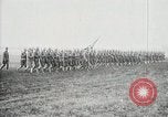 Image of US Army troops and band marching with flag during training United States USA, 1916, second 41 stock footage video 65675022632