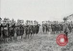 Image of US Army troops and band marching with flag during training United States USA, 1916, second 46 stock footage video 65675022632