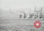 Image of US Army troops and band marching with flag during training United States USA, 1916, second 54 stock footage video 65675022632