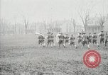 Image of US Army troops and band marching with flag during training United States USA, 1916, second 55 stock footage video 65675022632