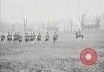 Image of US Army troops and band marching with flag during training United States USA, 1916, second 60 stock footage video 65675022632