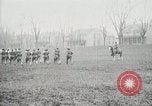 Image of US Army troops and band marching with flag during training United States USA, 1916, second 61 stock footage video 65675022632
