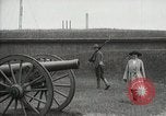 Image of US Army soldier shows cannon to woman United States USA, 1916, second 6 stock footage video 65675022633