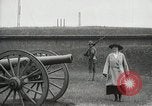 Image of US Army soldier shows cannon to woman United States USA, 1916, second 8 stock footage video 65675022633