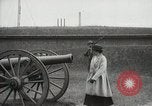 Image of US Army soldier shows cannon to woman United States USA, 1916, second 10 stock footage video 65675022633