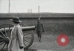 Image of US Army soldier shows cannon to woman United States USA, 1916, second 13 stock footage video 65675022633