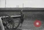 Image of US Army soldier shows cannon to woman United States USA, 1916, second 15 stock footage video 65675022633