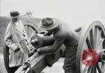 Image of US Army soldier shows cannon to woman United States USA, 1916, second 23 stock footage video 65675022633