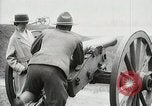 Image of US Army soldier shows cannon to woman United States USA, 1916, second 28 stock footage video 65675022633