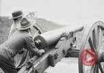 Image of US Army soldier shows cannon to woman United States USA, 1916, second 33 stock footage video 65675022633