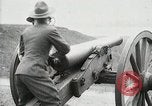 Image of US Army soldier shows cannon to woman United States USA, 1916, second 39 stock footage video 65675022633