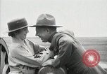 Image of US Army soldier shows cannon to woman United States USA, 1916, second 47 stock footage video 65675022633