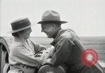 Image of US Army soldier shows cannon to woman United States USA, 1916, second 48 stock footage video 65675022633