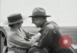 Image of US Army soldier shows cannon to woman United States USA, 1916, second 49 stock footage video 65675022633