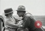 Image of US Army soldier shows cannon to woman United States USA, 1916, second 50 stock footage video 65675022633