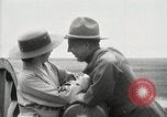 Image of US Army soldier shows cannon to woman United States USA, 1916, second 51 stock footage video 65675022633