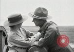 Image of US Army soldier shows cannon to woman United States USA, 1916, second 52 stock footage video 65675022633