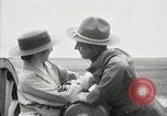 Image of US Army soldier shows cannon to woman United States USA, 1916, second 53 stock footage video 65675022633