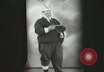 Image of Fat man playing tiny drum vintage humor United States USA, 1916, second 6 stock footage video 65675022634