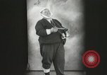 Image of Fat man playing tiny drum vintage humor United States USA, 1916, second 8 stock footage video 65675022634
