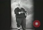 Image of Fat man playing tiny drum vintage humor United States USA, 1916, second 11 stock footage video 65675022634