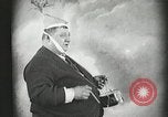 Image of Fat man playing tiny drum vintage humor United States USA, 1916, second 14 stock footage video 65675022634