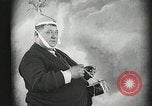Image of Fat man playing tiny drum vintage humor United States USA, 1916, second 16 stock footage video 65675022634