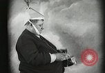 Image of Fat man playing tiny drum vintage humor United States USA, 1916, second 19 stock footage video 65675022634