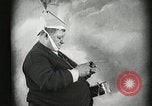 Image of Fat man playing tiny drum vintage humor United States USA, 1916, second 20 stock footage video 65675022634