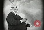 Image of Fat man playing tiny drum vintage humor United States USA, 1916, second 23 stock footage video 65675022634