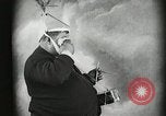 Image of Fat man playing tiny drum vintage humor United States USA, 1916, second 27 stock footage video 65675022634