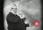 Image of Fat man playing tiny drum vintage humor United States USA, 1916, second 28 stock footage video 65675022634