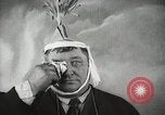 Image of Fat man playing tiny drum vintage humor United States USA, 1916, second 30 stock footage video 65675022634