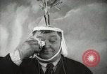Image of Fat man playing tiny drum vintage humor United States USA, 1916, second 37 stock footage video 65675022634