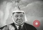 Image of Fat man playing tiny drum vintage humor United States USA, 1916, second 42 stock footage video 65675022634