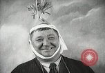 Image of Fat man playing tiny drum vintage humor United States USA, 1916, second 55 stock footage video 65675022634