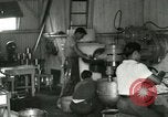 Image of Hawaiian workers Hawaii USA, 1937, second 55 stock footage video 65675022653