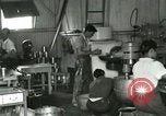 Image of Hawaiian workers Hawaii USA, 1937, second 56 stock footage video 65675022653
