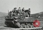 Image of Infantrymen riding on M46 tanks Korea, 1951, second 52 stock footage video 65675022679