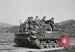 Image of Infantrymen riding on M46 tanks Korea, 1951, second 53 stock footage video 65675022679
