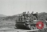 Image of Infantrymen riding on M46 tanks Korea, 1951, second 54 stock footage video 65675022679