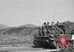Image of Infantrymen riding on M46 tanks Korea, 1951, second 55 stock footage video 65675022679