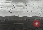 Image of Massive air drop by 187th Airborne Regimental Combat Team Korea, 1951, second 16 stock footage video 65675022693