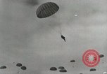 Image of Massive air drop by 187th Airborne Regimental Combat Team Korea, 1951, second 25 stock footage video 65675022693
