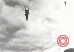 Image of Massive air drop by 187th Airborne Regimental Combat Team Korea, 1951, second 33 stock footage video 65675022693