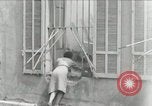 Image of French people dig in rubble Aix-en-Provence France, 1944, second 1 stock footage video 65675022698